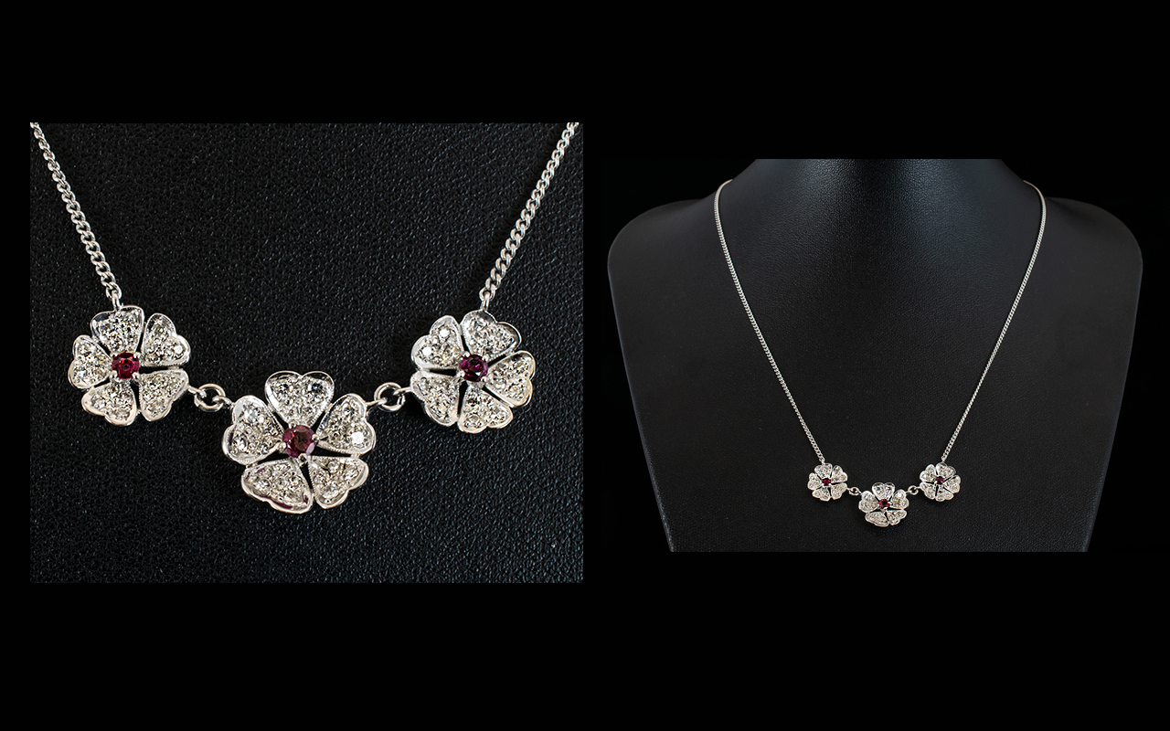 A Contemporary 18ct White Gold Ruby And Diamond Set Pendant Necklace Set with three flowerhead - Image 2 of 2