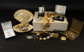 A Mixed Collection Of Costume Jewellery And Watches A varied collection contained in linen covered