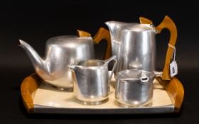 Picquot Ware Mid Century Tea And Coffee Set Five piece set of typical form in stainless steel,