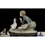 Lladro Porcelain Figure 'Feeding the Ducks' model No. 4849. Issued 1973-1995. Height 6.5" - 16.