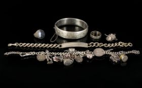 A Collection Of Silver and Mixed Metal Jewellery six items in total to include charm bracelet,