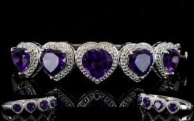 Amethyst Heart Cut Hinged Bangle, five heart cut deep purple amethysts graduating from the central