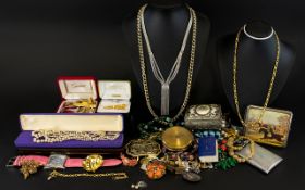 A Mixed Collection Of Costume Jewellery A varied collection to include wrist watch, beads,