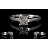 18ct White Gold Contemporary Diamond Set Dress Ring the four square cut diamonds of good colour and