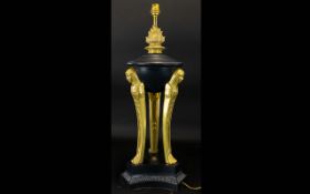 Egyptian Style Table Lamp, black plinth with gilt columns and decorative finial. Height 24".