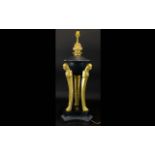 Egyptian Style Table Lamp, black plinth with gilt columns and decorative finial. Height 24".