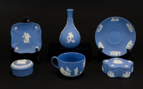 A Collection Of Wedgwood Blue Jasperware Items Five items in total to include circular trinket box,