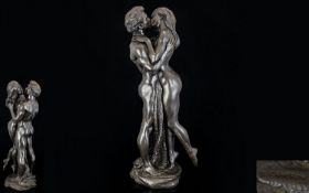 Heredity Bronzed Resin Figure by R. Cameron titled 'The Embrace' circa 1990s. Stands 14.25'' 36.25