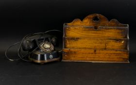 A Vintage Telephone Along With A Wooden Letter Rack To include traditional black and gilt dial