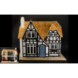 Dolls House In Tudor Style - circa early to mid 20th Century, height 21 Inches,