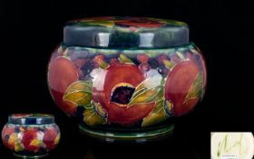 William Moorcroft Signed Round Lidded Powder Bowl, In The ' Ochre Pomegranate ' Design on Blue