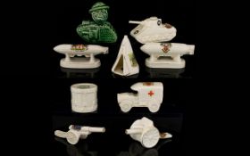 Crested Ware Collection of Early 20th Century Military Pieces ( 9 ) Nine Pieces In Total.