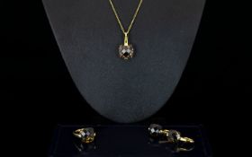 A Contemporary Silver Vermeil And Smoky Topaz Jewellery Suite Comprising pendant necklace, wired