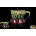 Moorcroft Modern Tubelined Stylised Design Cup in first quality mint condition.