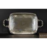 Victorian Period Good Quality and Heavy Twin Handle Silver Tray profusely decorated to borders and