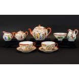 Japanese Part Tea Service Comprising teapot, two cups and accompanying saucers, sugar bowl and