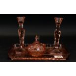 A Pink Coloured Glass Dressing Table set