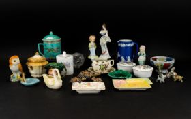 A Collection Of Ceramics And Pottery To