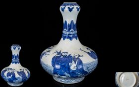 A 20th Century Blue And White Onion Topped Vase Blue and white decoration depicting scholars,