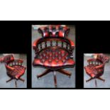 Leather Swivel Captains Chair, Button back oxblood leather with upholstered back rest and seat,