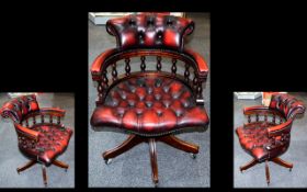 Leather Swivel Captains Chair, Button back oxblood leather with upholstered back rest and seat,