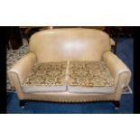 An Early 20th Century Two Seater Sofa art deco, tab sofa with x2 removable cushions.