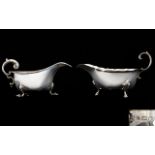 Art Deco Period Silver Sauce Boat Raised on Stepped Spade Feet with Scroll Handle.