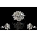 18ct White Gold Attractive and Stylish Baguette and Brilliant Cut Diamond Set Cluster Ring ' Swirl