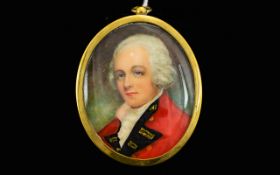 Framed Portrait Miniature Depicting a Georgian gentleman in red topcoat. Housed in oval gilt mount.