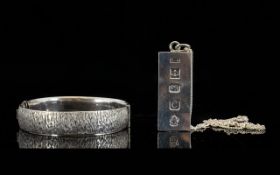 A 1970'S Silver Hinged Bangle Textured design, fully hallmarked Birmingham 1976.
