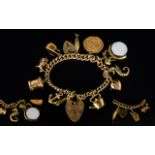 9ct Gold Curb Bracelet Loaded with 10 x 9ct Gold Charms - One 22ct Gold Half Sovereign - Dated 1914
