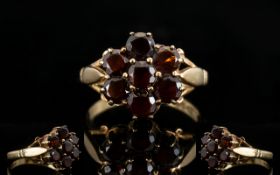 Ladies - Attractive 9ct Gold Garnet Set Cluster Ring ' Flower head ' Setting. Full Hallmark 9.