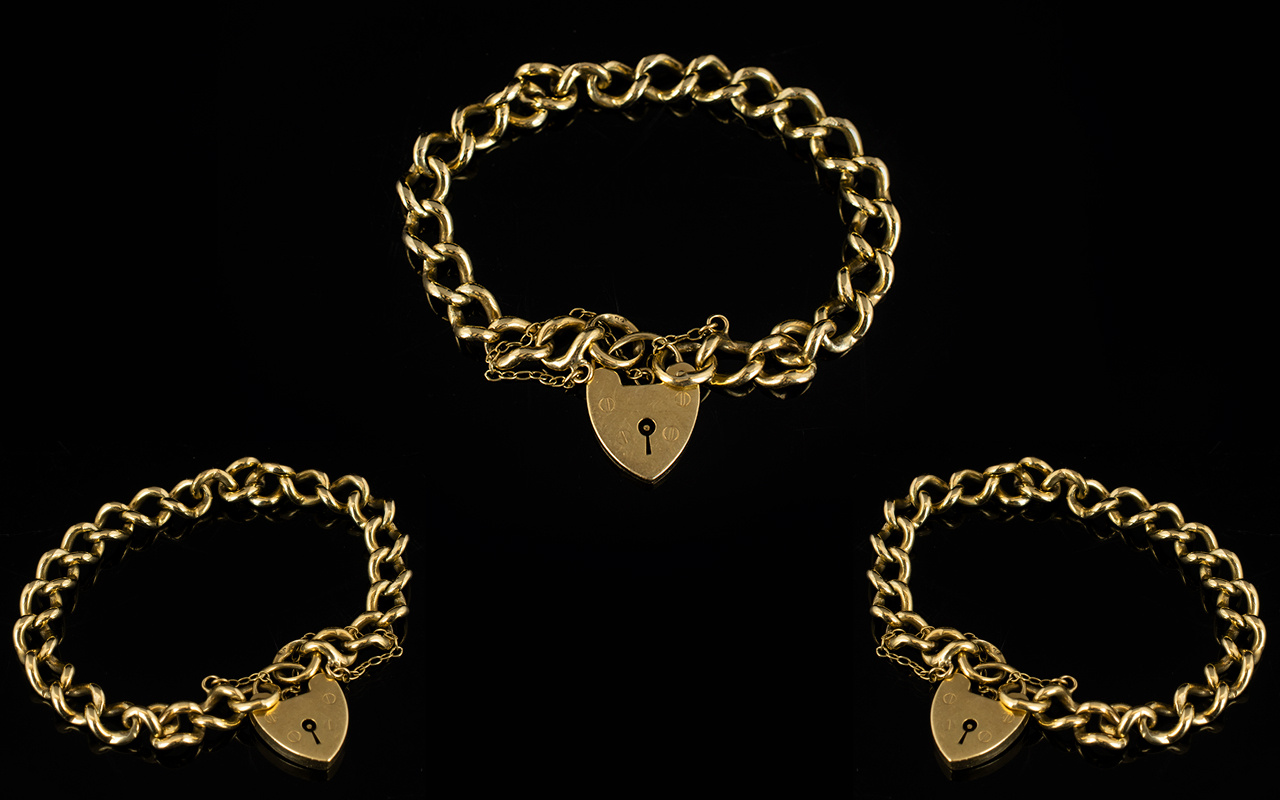 9ct Gold Curb Bracelet with 9ct Gold Heart Shaped Padlock and Safety Chain,