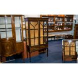 Early 20th Century Glazed Display Cabinet Astral glazed two door cabinet raised on square tapering