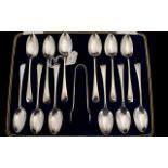 1920's Boxed - Delux Set of 12 Silver Teaspoons with Matching Pair of Silver Sugar Nips.