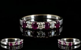 18ct White Gold - Attractive Ruby and Diamond Dress Ring, The Four Rubies Interspaced with Diamonds,