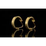 18ct Gold Pair of Hoop Earrings, Patterned 3/4 hoop earrings with hinged wire stem. Hallmarked 750.