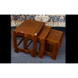 Teak Nest Of Three Tables G-Plan style - unmarked. Height, 16 inches, 20 x 15 inches.