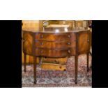 A Mid 20th Century Reproduction Serpentine Fronted Mahogany Sideboard - shaped front,