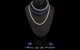 A Mixed Collection Of Costume Jewellery A varied lot to include purple quartz beaded necklace,