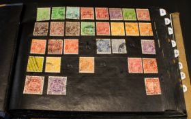 A Stamp Album Containing A Mixed Collection Of Commonwealth And International Stamps To include