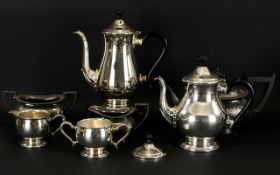 A Mixed Collection Of Plated Ware Seven items in total to include early 20thC Walker and Hall