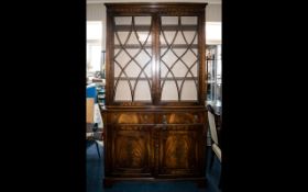 A 1980's Astral Glazed Bookcase - Bookcase top on storage base with four shelves and cupboard.