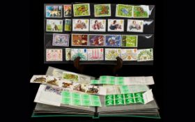 Accumulation of Mint Stamps In Small Stock Book And On Cards.