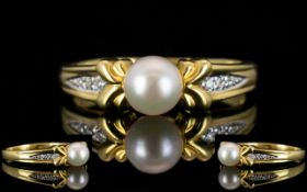 18ct Gold - Attractive Pearl and Diamond Set Dress Ring. The Central Pearl with Diamond Shoulders.