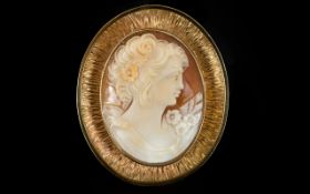 Attractive and Quality Shell Cameo / Brooch / Pendant within a 9ct Gold Oval Shaped Mount.