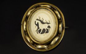 Equestrian Interest A Victorian Ivory And Yellow Metal Brooch Of circular form with pin back