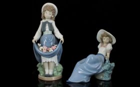 Two Nao Figures one depicting a young woman with flowers in her pinafore, approx 9" high,