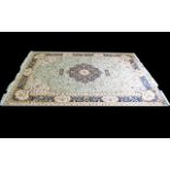 A Very Large Woven Silk Carpet Keshan rug with Eau De Nil ground and traditional Middle Eastern
