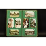 Antique Postcard Album Containing a quantity of early 20th century cards.